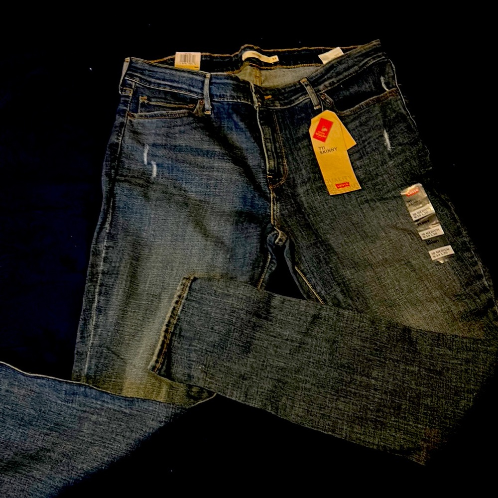 18 medium w34 L 30 711 skinny mid rise slim through hi and thigh blue Jean